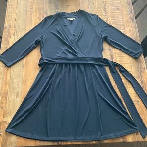 Daytime to evening dress that shows all the good things and hides the rest.